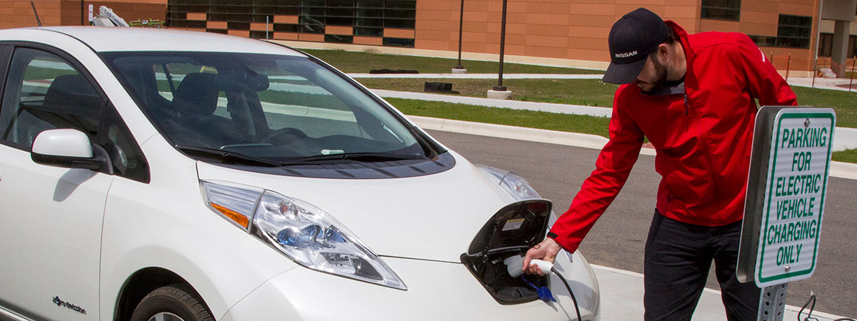 CLC student charging his electronic vehicle on campus