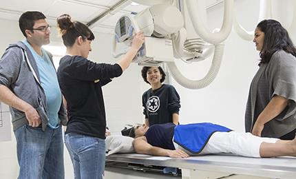 Students learn to use medical imaging equipment